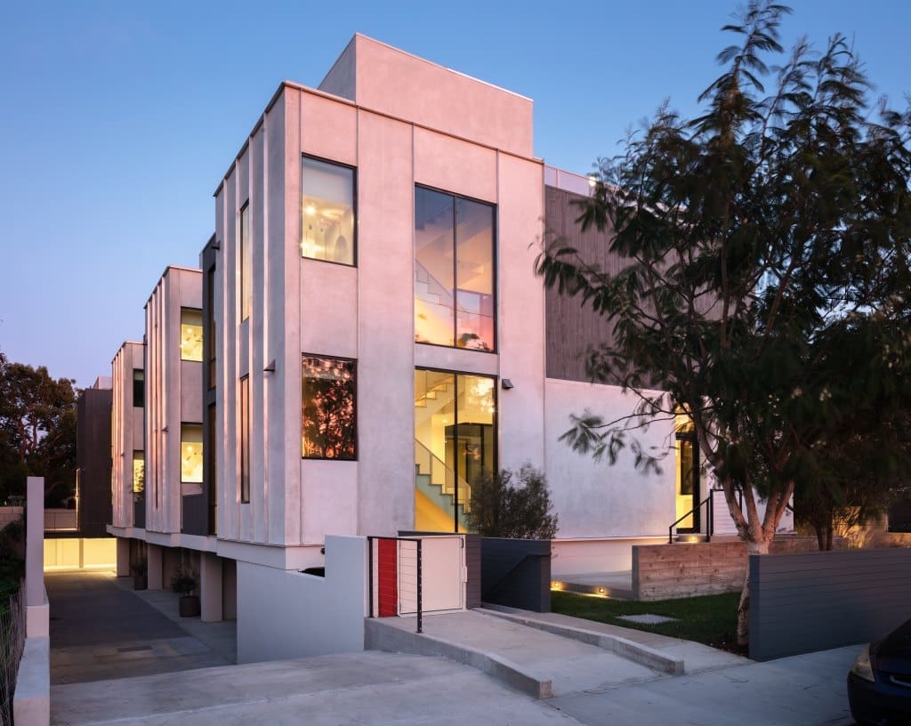 The exterior of a modern new home in Culver City, LA that uses three wall Skybox to access their roof decks.