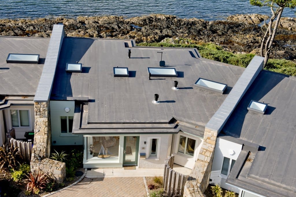 flat roof with skylights installed on by the sea